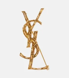 Opyum YSL brooch