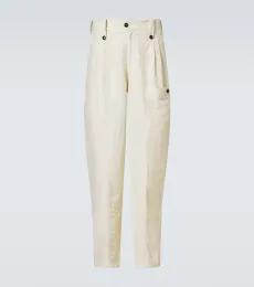 Pantalon fuselé à pinces
