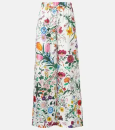 Pantalon palazzo Flora en soie à fleurs