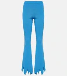 Pantalones slim acanalados desgastados Pantalones slim acanalados desgastados