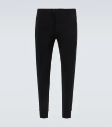 Pantalones slim en mezcla de algodón técnicos Pantalones slim en mezcla de algodón técnicos