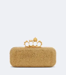 Pochette Knuckle en cuir à ornements Pochette Knuckle en cuir à ornements