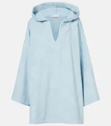 Poncho à capuche en coton éponge Poncho à capuche en coton éponge
