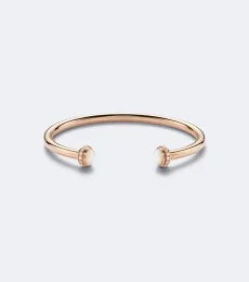 Posession 18kt rose gold cuff bracelet with mother-of-pearl and diamonds Posession 18kt rose gold cuff bracelet with mother-of-pearl and diamonds
