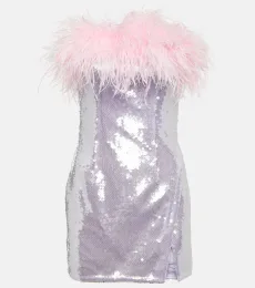 Robe à sequins et plumes Robe à sequins et plumes