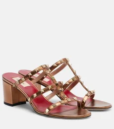 Rockstud metallic leather mules Rockstud metallic leather mules