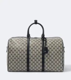 Sac de voyage Gucci Essence Medium en toile GG Sac de voyage Gucci Essence Medium en toile GG