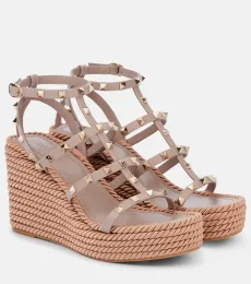 Sandales compensées en cuir Sandales compensées en cuir