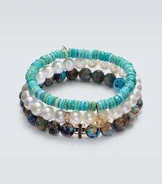 Set de 3 bracelets en or 14 ct et pierres précieuses Set de 3 bracelets en or 14 ct et pierres précieuses