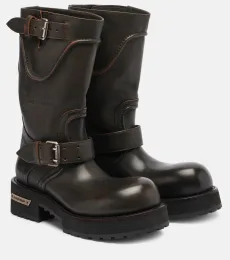 Venom debossed leather boots