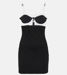 Vestido corto en jersey y PVC