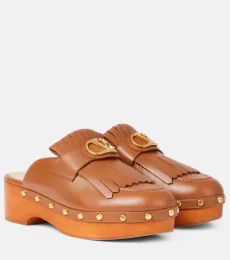 VLogo fringed leather clogs VLogo fringed leather clogs