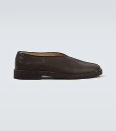 Zapatos slip-on de piel ribeteada Zapatos slip-on de piel ribeteada