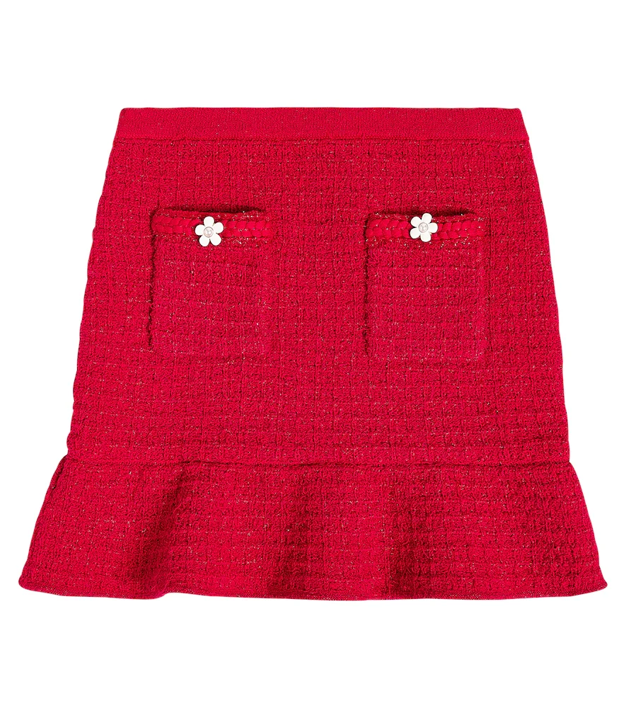 Falda con peplum adornada