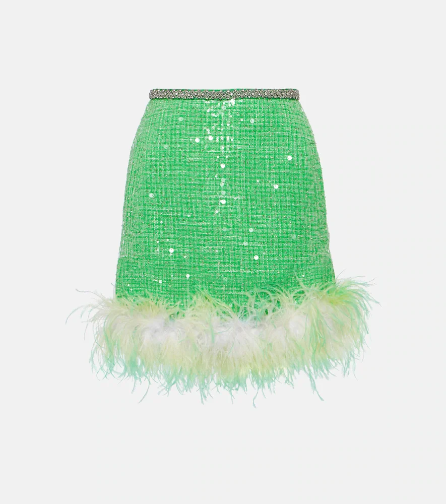 Mini-jupe en bouclé à plumes et paillettes